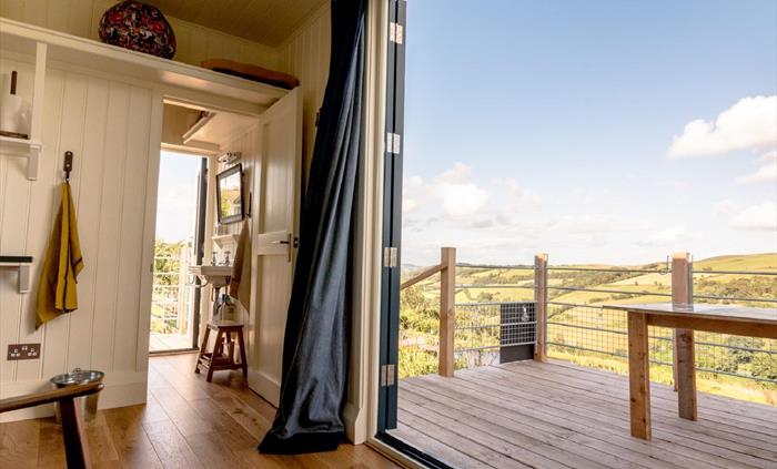 Enjoy far-reaching valley views from the Pantechnicon Powys alfresco dining deck.